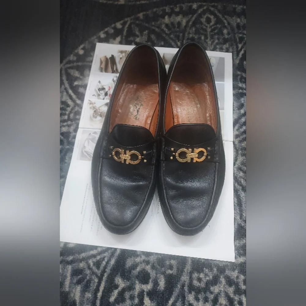 Salvatore Ferragamo Black and Gold Loafers with Signature Hardware. - Picture 2 of 9